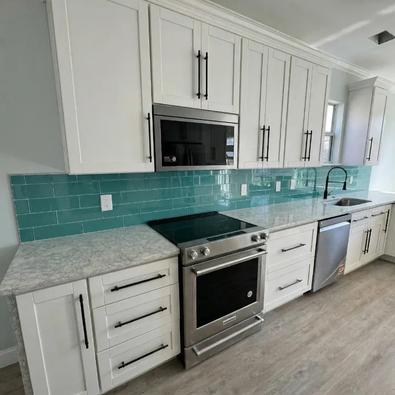 Kitchen after backsplash installation by Paez And More